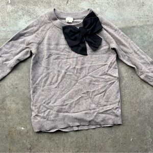 Grey Kate Spade New York sweater with black bow size medium